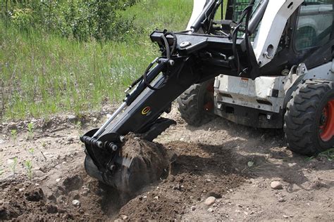 hot to dig a hole with a skid steer|digging holes with skid steer.